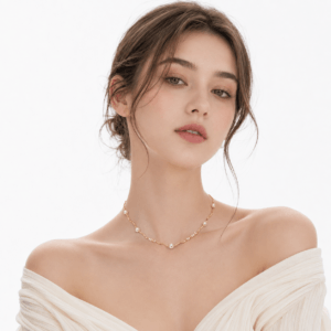 Model wearing gold organic wave chain pearl station necklace | Pearl Jewelry Manufacturer | Ideal Pearl Co.