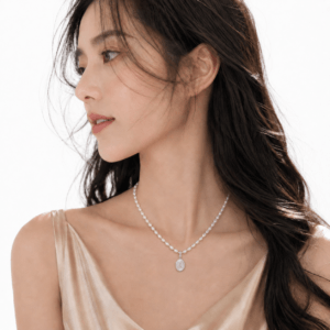 Model wearing minimal pearl butterfly pendant collarbone necklace | Pearl Jewelry Boutique | Ideal Pearl Co.