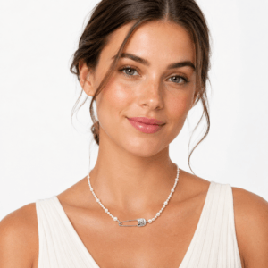 Model wearing pearl safety pin pendant station necklace | Pearl Jewelry Boutique | Ideal Pearl Co.