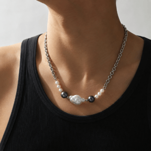 Model wearing men's baroque pearl and onyx necklace | Ideal Pearl Co.