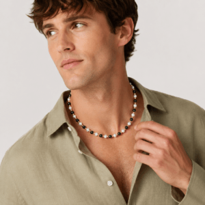 Man wearing pearl and onyx necklace with gold vermeil accents | Ideal Pearl Co.