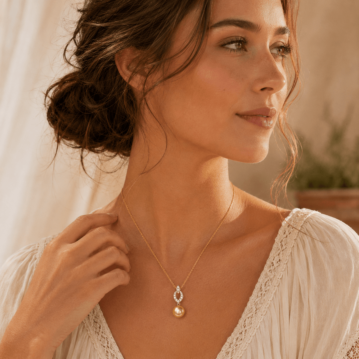 Golden South Sea pearl diamond pendant necklace worn on model | Ideal Pearl Co.