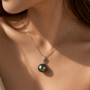 Tahitian pearl and diamond pendant necklace worn on model | Ideal Pearl Co.