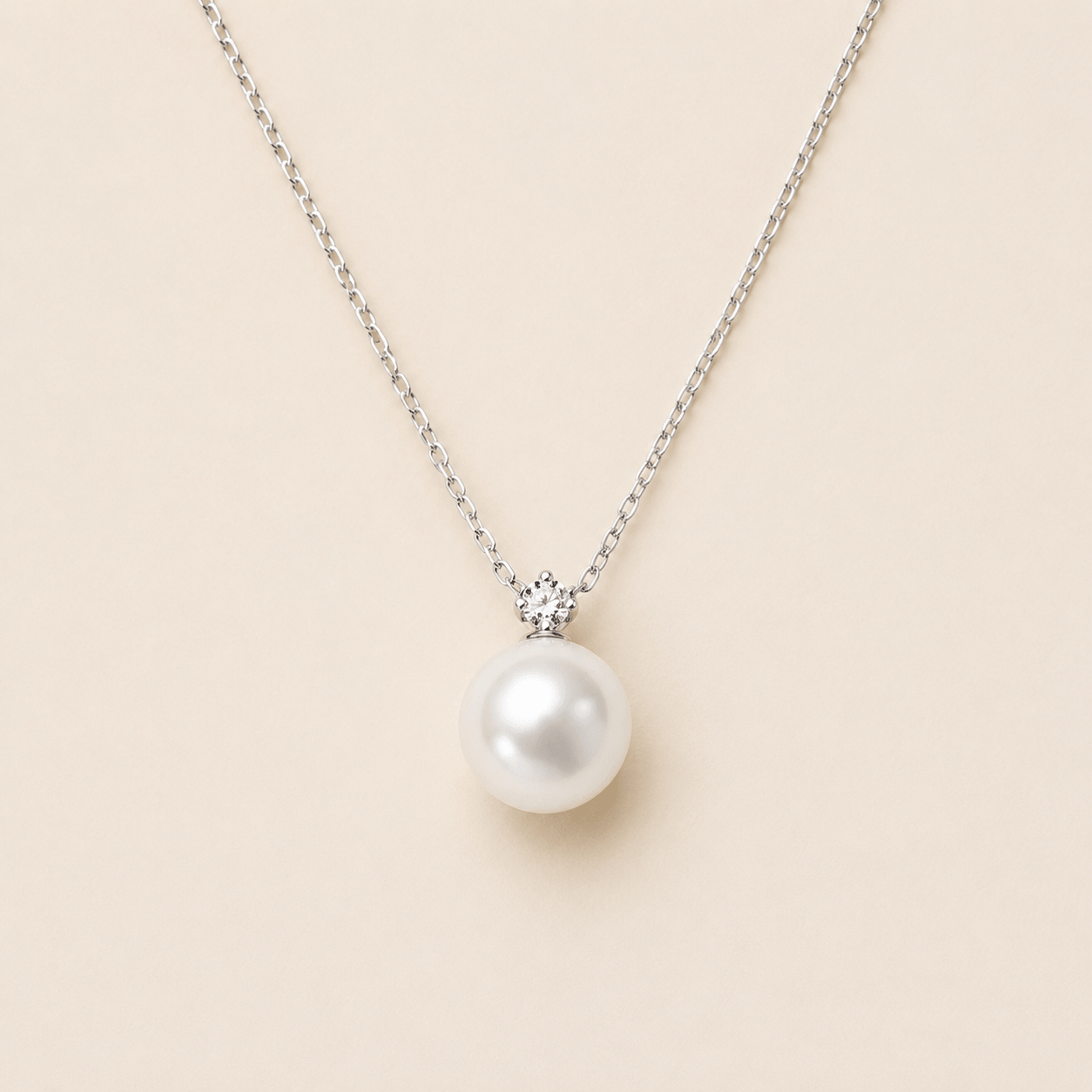 Classic white South Sea pearl pendant with diamond bail in 18K white gold | Ideal Pearl Co.