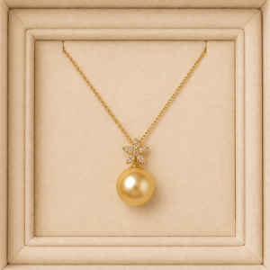 Golden South Sea pearl solitaire necklace in 18K gold with floral diamond bail | Ideal Pearl Co.
