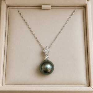 Tahitian pearl solitaire necklace with diamond bail in 18K white gold | Ideal Pearl Co.
