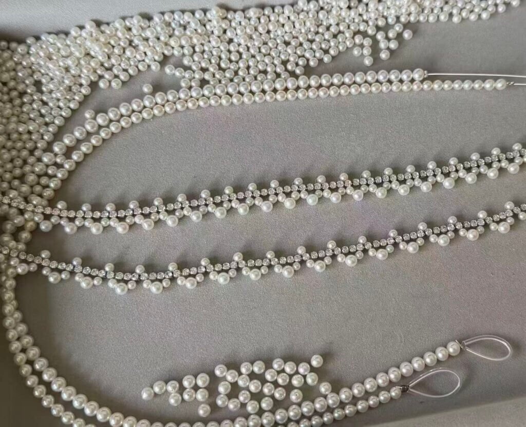 Freshwater pearls sorted by color, size and luster for custom necklace development.